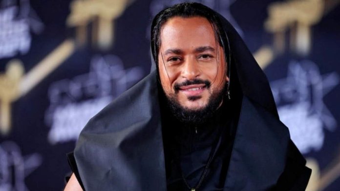 Le Succès de Slimane Persiste Malgré les Accusations : Une Histoire de Résilience et de Talent